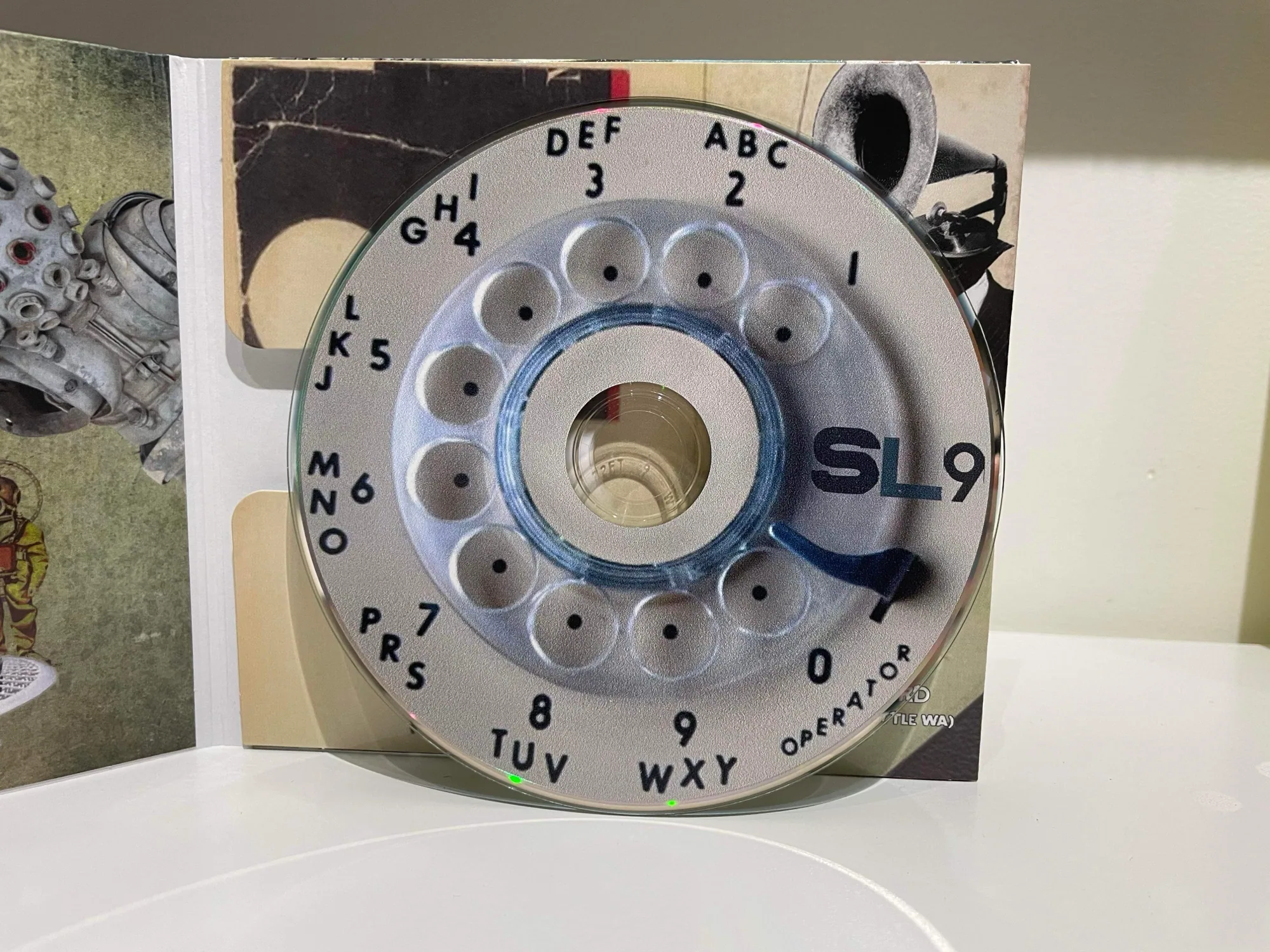 SL9: Disc · Rotary dial print